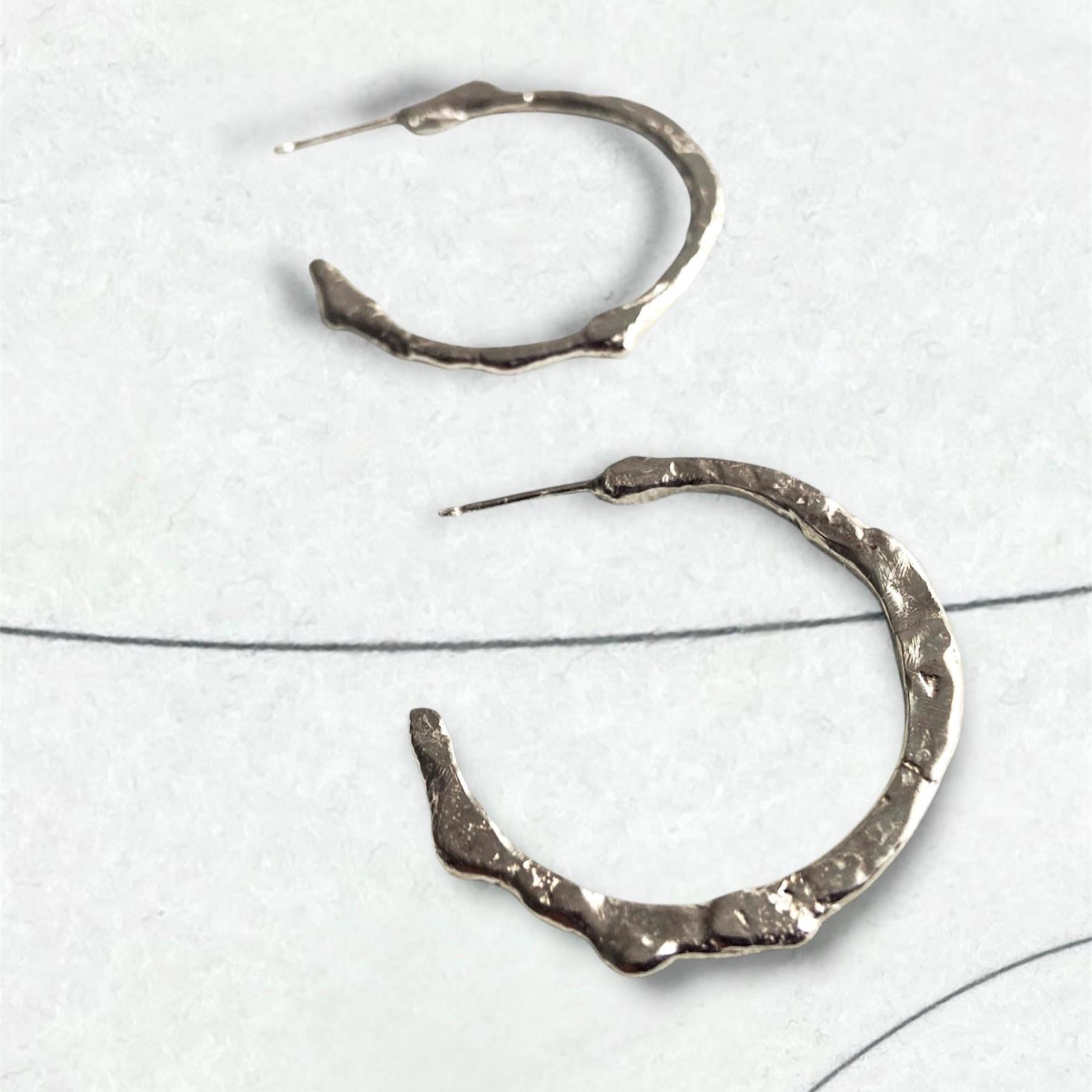 Irregular large hoop earrings in Sterling silver, Handmade molten metal Boho Style
